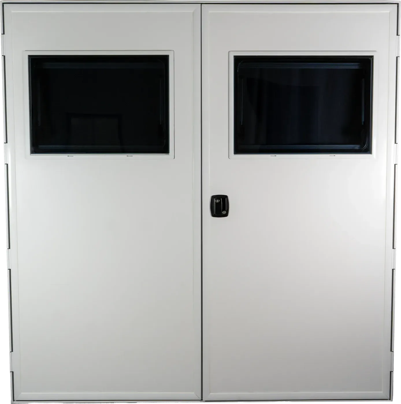A pair of white Foundation Vehicles insulated barn doors, each with a tinted window, closed with a center latch
