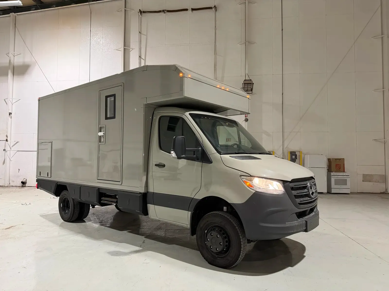 Stone Gray Mercedes-Benz Sprinter 170 composite camper, side profile showing the full composite body